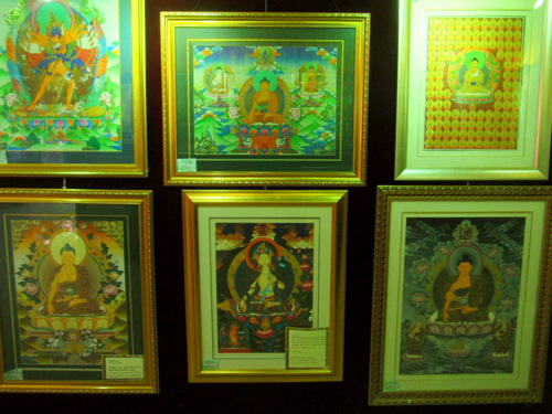 Various Buddha Paintings at the on site store.